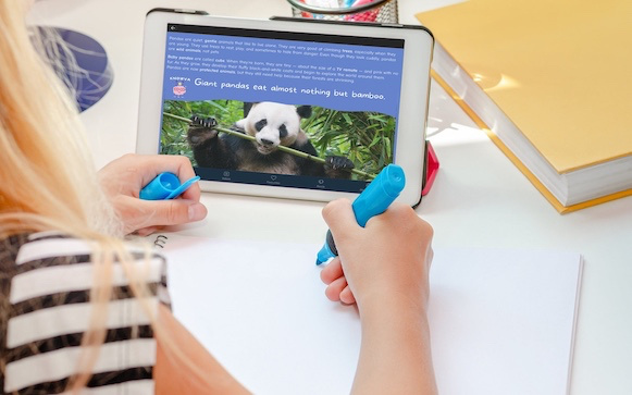 Knowva on Tablet A young person using Knowva on her tablet to help with homework about Giant Pandas.